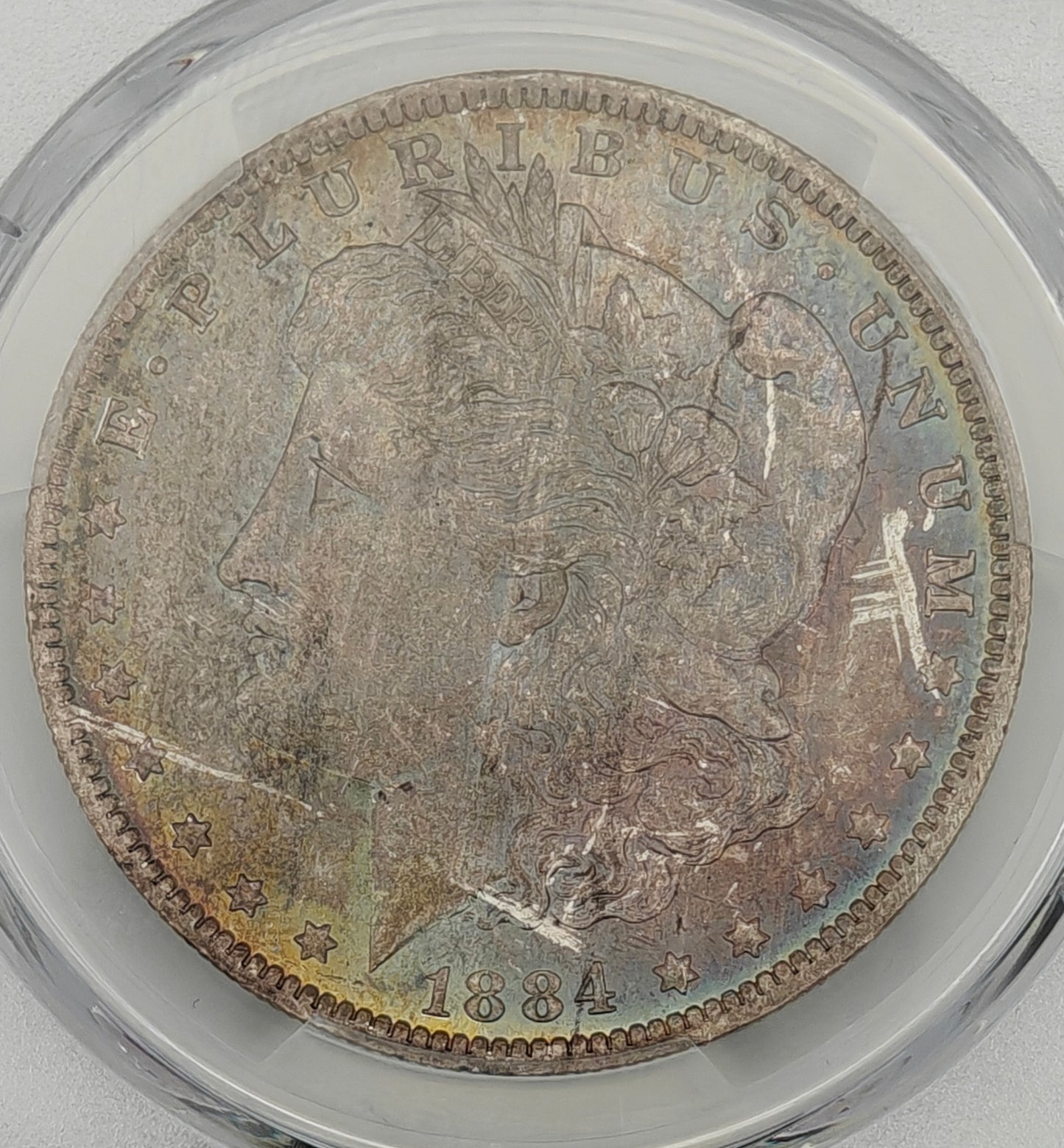1884-O Morgan Dollar MS-63 PCGS (Rainbow Toned)
