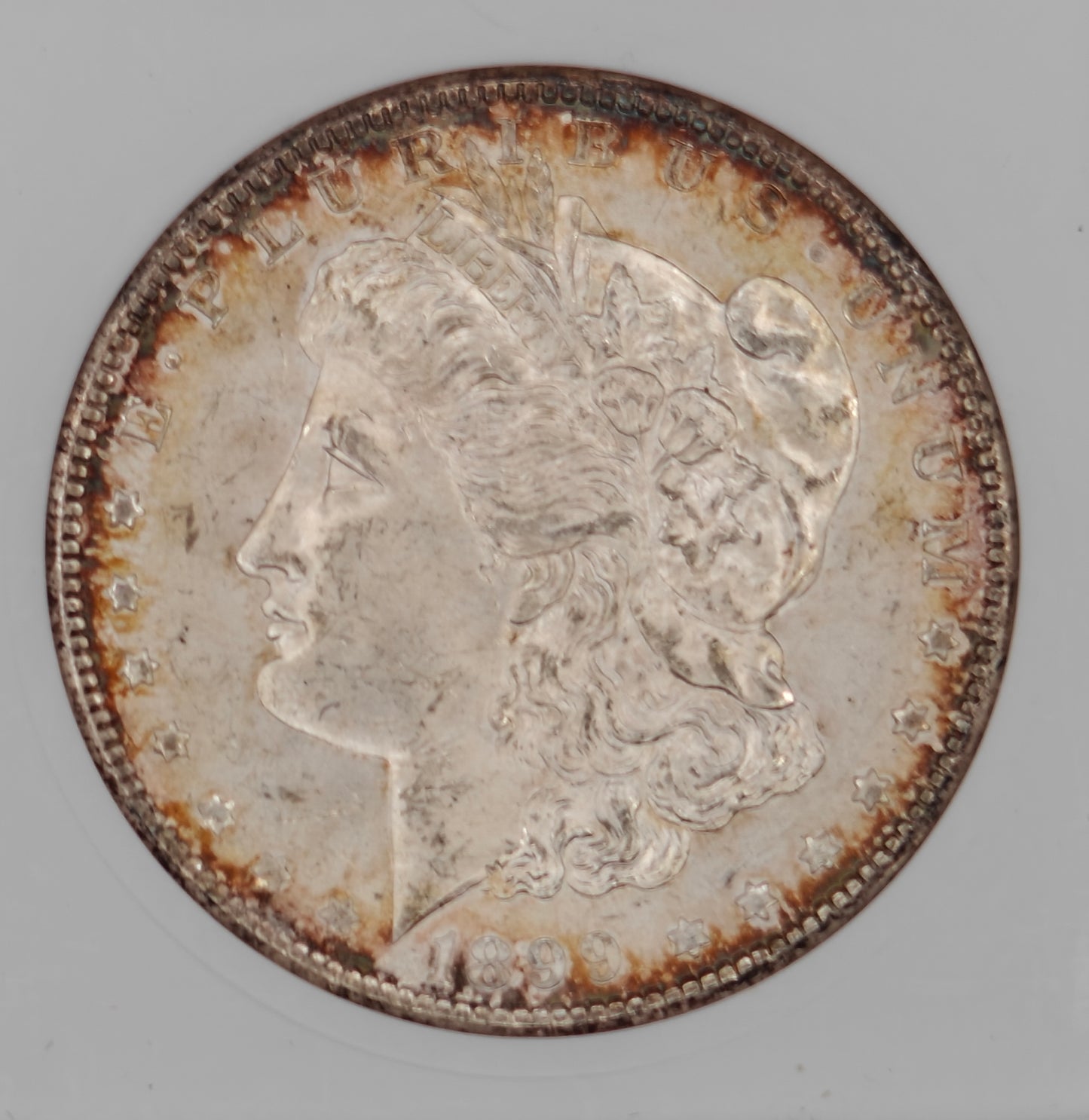 1899-O Morgan Dollar MS-64 ANACS (Beautiful Toning)