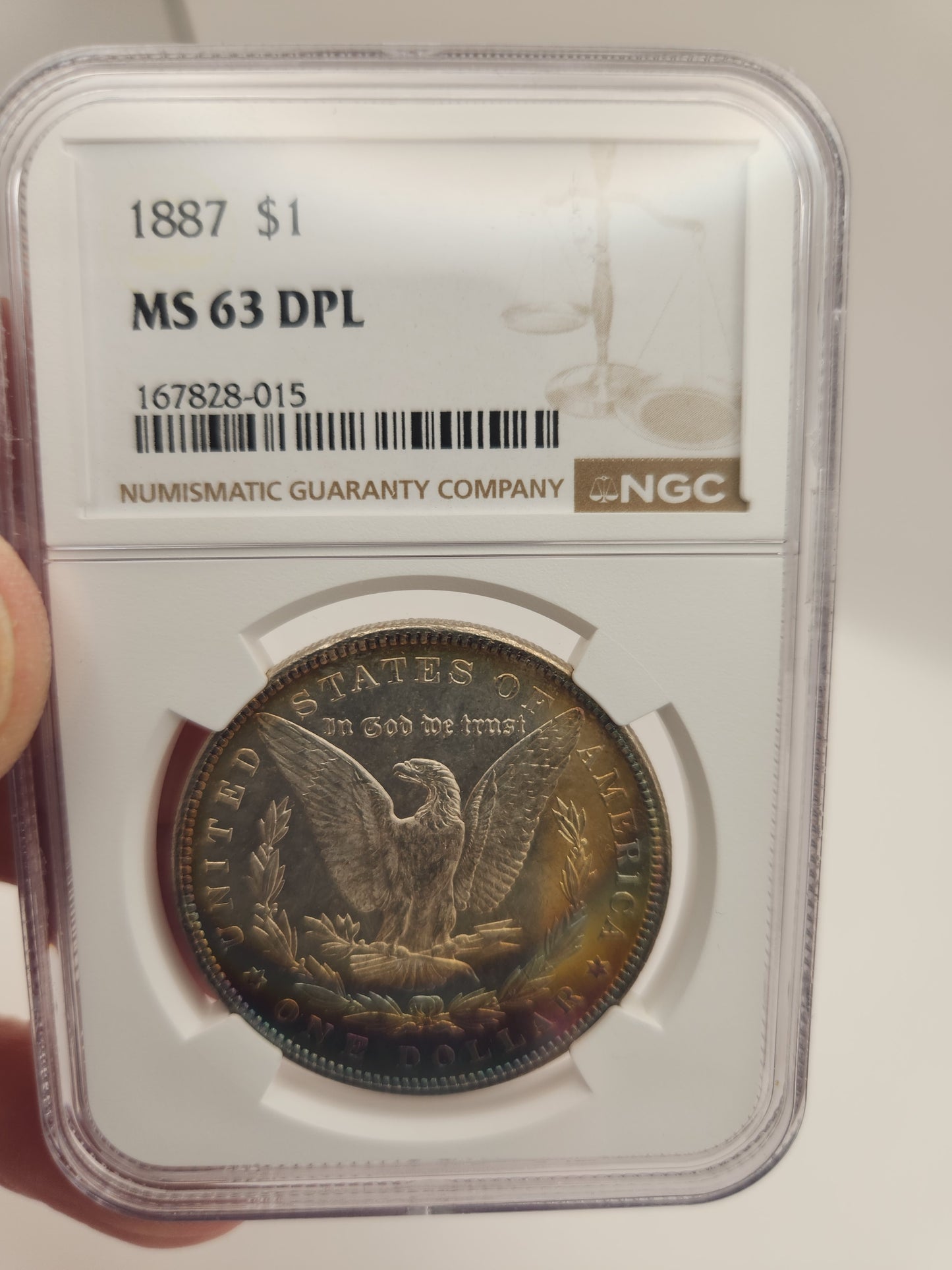 1887 Morgan Dollar MS-63 NGC (DPL, Beautiful Toning)